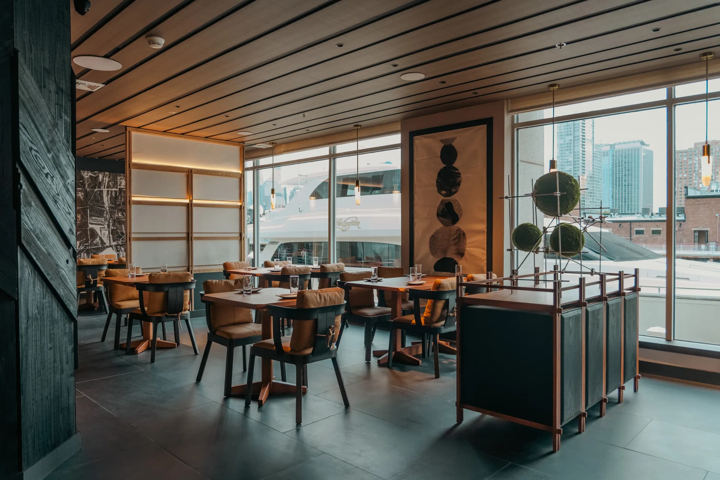 Tables by the waterfront windows