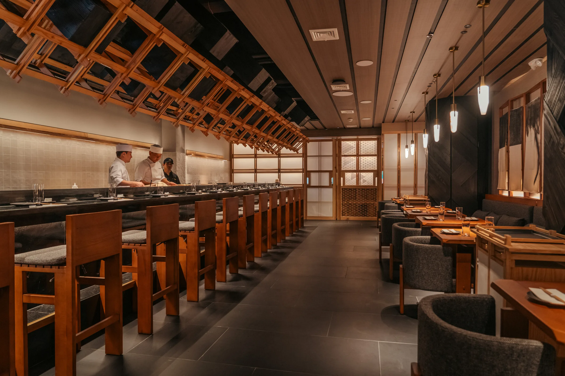 Chefs working the sushi counter